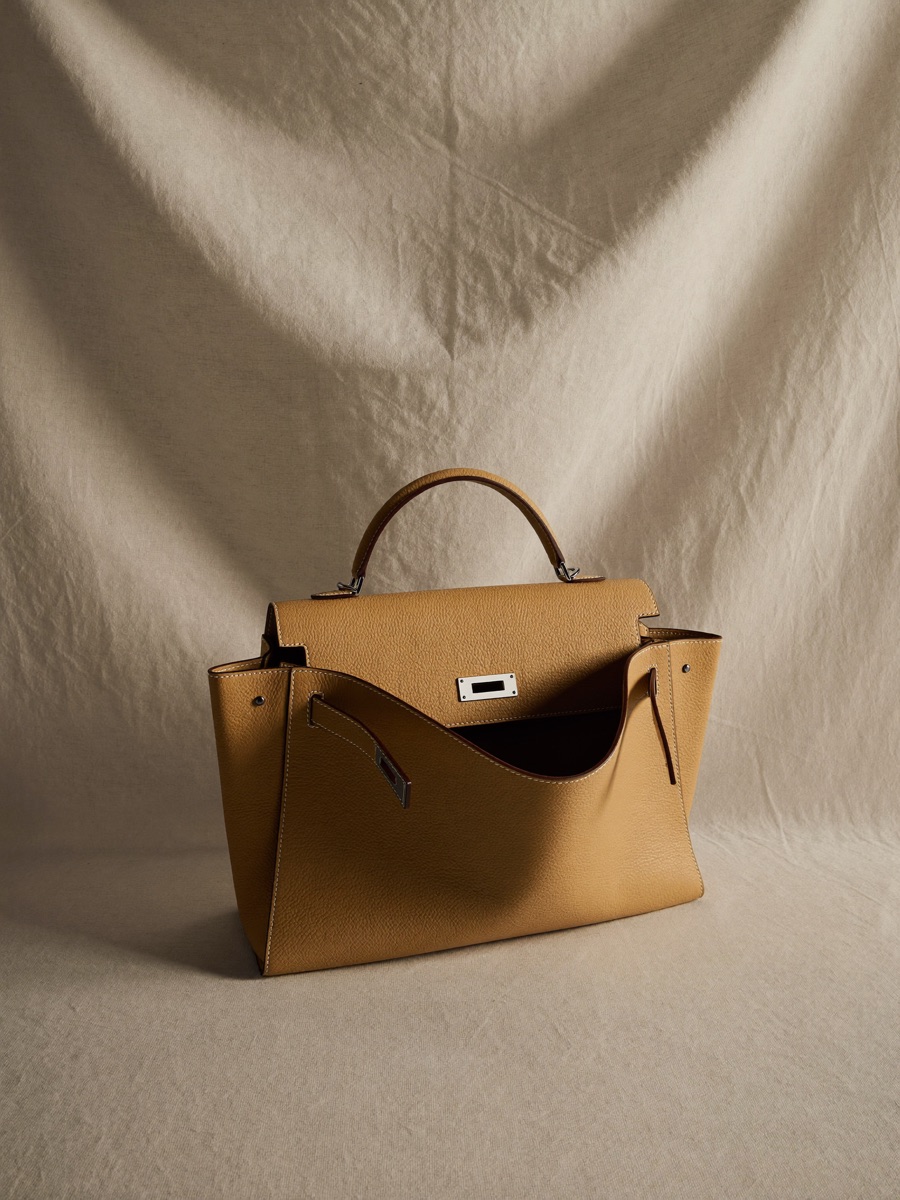 Structured tan leather top-handle handbag